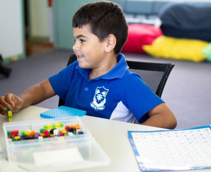 Aboriginal student playing blocks for maths activity