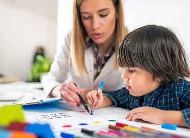 Child having psychology assessment with psychologist