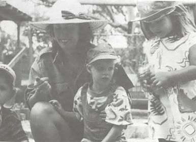 Learning Links Preschool children and teacher outside in 1993