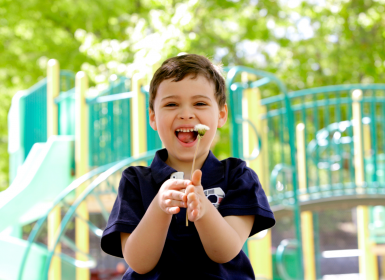 Young child with disability in playground