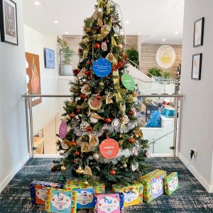 Decorated Christmas tree with presents underneath