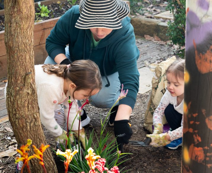 Preschool teacher gardening with children_Learning Links